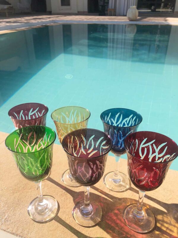 https://www.scentsandfeel.com/wp-content/uploads/2023/01/CARVED-leaves-WINE-GLASS-SET-OF-6-ASSORTED-COLORS-1-600x800.jpg